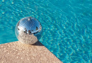 Disco ball beside resort swimming pool